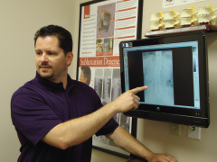 Gary Hagner, D.C. showing chiropractic scans